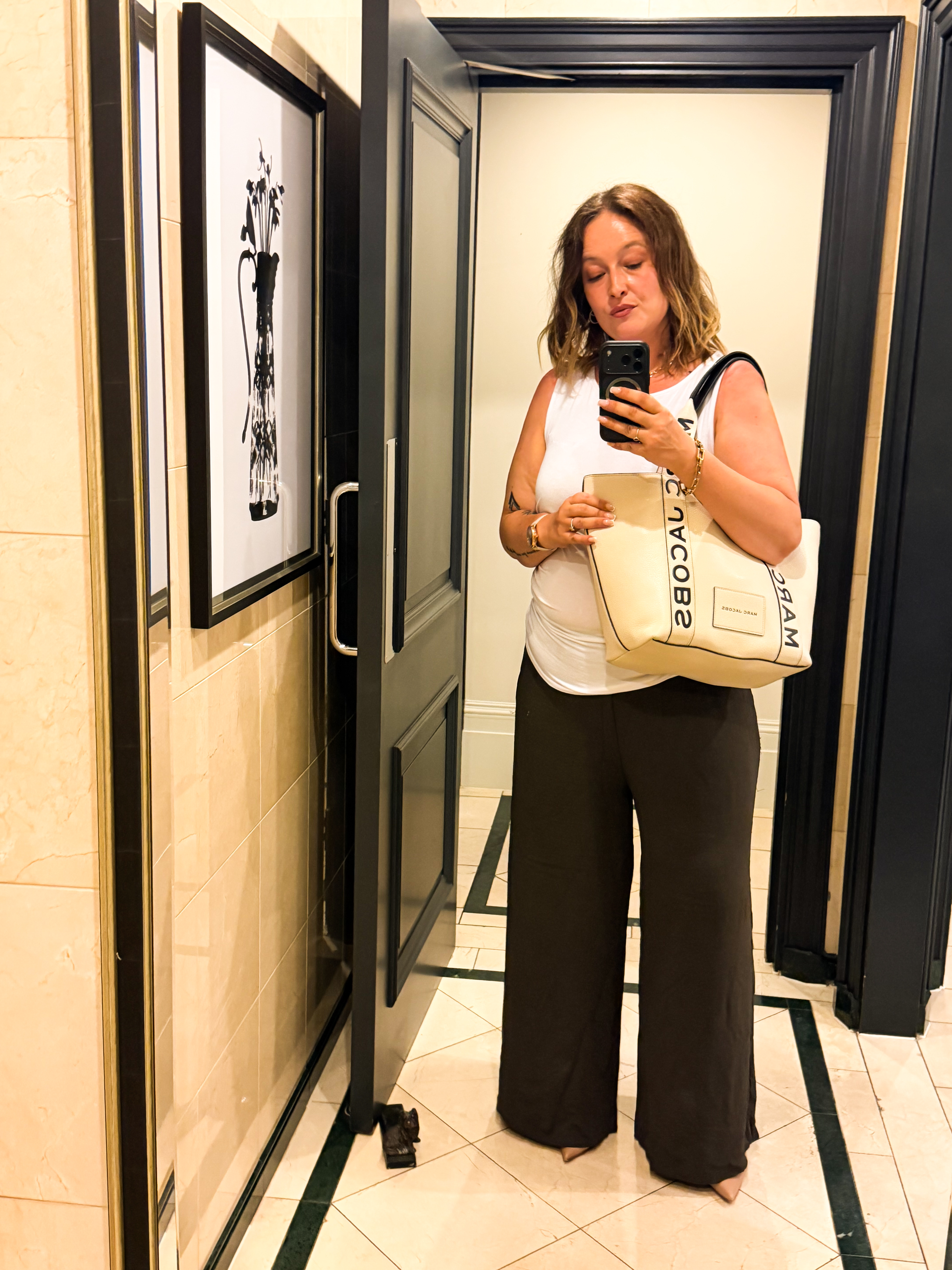 Neutral outfit details for a day in the city with Marc Jacobs bag and Louboutin Sporty Kates