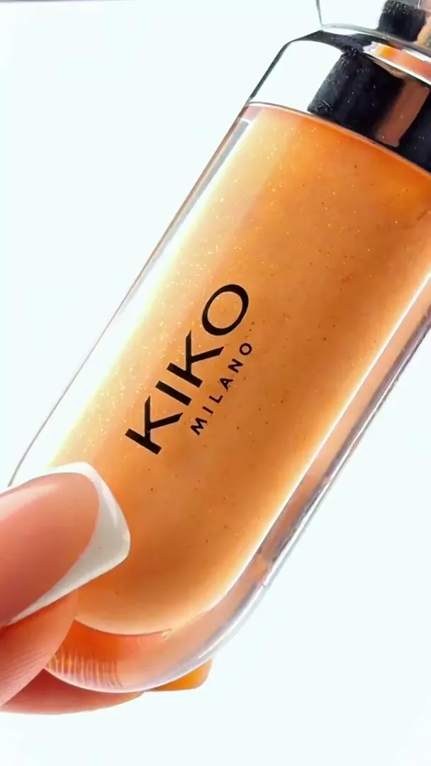 KIKO Milano 02 foundation bottle held in hand macro editorial shot, UK beauty UGC creator content